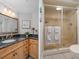 Bathroom with walk-in shower and updated fixtures at 1660 Gulf Blvd # 706, Clearwater Beach, FL 33767