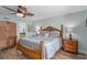 Main bedroom with king bed and armoire at 1660 Gulf Blvd # 706, Clearwater Beach, FL 33767