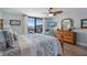 Spacious bedroom with water view, king-size bed, and updated furnishings at 1660 Gulf Blvd # 706, Clearwater Beach, FL 33767