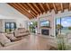 Community room with ocean view, fireplace, and comfy seating at 1660 Gulf Blvd # 706, Clearwater Beach, FL 33767