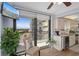 Kitchen with water views and a breakfast bar at 1660 Gulf Blvd # 706, Clearwater Beach, FL 33767