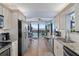 Modern kitchen boasts stainless steel appliances and stunning water views at 1660 Gulf Blvd # 706, Clearwater Beach, FL 33767