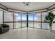 Bright living room with large windows and ocean view at 1660 Gulf Blvd # 706, Clearwater Beach, FL 33767
