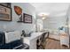 Home office with desk, printer, and view into bedroom at 1660 Gulf Blvd # 706, Clearwater Beach, FL 33767