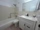 Updated bathroom with a modern vanity and walk-in shower at 2460 Canadian Way # 6, Clearwater, FL 33763