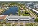 An aerial view of a waterfront property with boat docks and easy access to nearby amenities at 3717 46Th S Ave # 6, St Petersburg, FL 33711