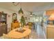 Round dining table, Christmas tree and view into living area at 3717 46Th S Ave # 6, St Petersburg, FL 33711