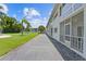 Exterior view of condominium, lush lawn and landscaping at 3717 46Th S Ave # 6, St Petersburg, FL 33711