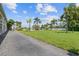 Scenic community grounds with palm trees and waterfront views at 3717 46Th S Ave # 6, St Petersburg, FL 33711