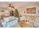 Comfortable living room with two sofas, a coffee table, and a Christmas tree at 3717 46Th S Ave # 6, St Petersburg, FL 33711