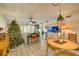 Cozy living room with a festive Christmas tree, and decorative lighting at 3717 46Th S Ave # 6, St Petersburg, FL 33711