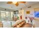 Bright living room with tile flooring, ceiling fan, and sliding glass doors to the outdoor area at 3717 46Th S Ave # 6, St Petersburg, FL 33711
