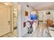 Spacious living area with an aquarium, a sofa, and access to the bathroom at 3717 46Th S Ave # 6, St Petersburg, FL 33711