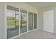 Covered patio features sliding glass doors with lovely water views, and tile flooring at 3717 46Th S Ave # 6, St Petersburg, FL 33711