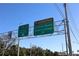 A road sign shows directions to Ft Desoto Park and St Pete Beach at 3717 46Th S Ave # 6, St Petersburg, FL 33711