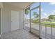 Screened porch with water views, tile flooring and a door for exterior access at 3717 46Th S Ave # 6, St Petersburg, FL 33711