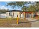 Cute bungalow with modern updates and covered porch at 3718 Deleuil Ave, Tampa, FL 33610