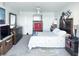 Main bedroom with king-size bed, coastal decor, and ample space at 4525 Cove Cir # 1002, St Petersburg, FL 33708