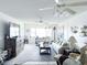 Spacious living room with comfy furniture and waterfront views at 4525 Cove Cir # 1002, St Petersburg, FL 33708
