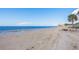 Expansive beach views and tranquil waterfront access at 4925 New England Blvd # 204, New Port Richey, FL 34652