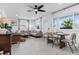 Open concept living and dining area with modern furniture and polished concrete floors at 5901 1St Ne St, St Petersburg, FL 33703