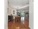 Charming dining room with hardwood floors and farmhouse table at 6212 43Rd N Ave, Kenneth City, FL 33709