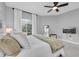 Comfortable bedroom with king-size bed and large window at 6323 Vista Verde E Dr, St Petersburg, FL 33707