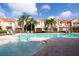 Community pool and spa surrounded by lush landscaping at 6323 Vista Verde E Dr, St Petersburg, FL 33707