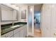 Modern bathroom with updated vanity and frosted glass door at 6888 121St N St, Seminole, FL 33772