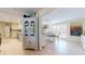 Bright dining area with white table, chairs, and large window with shutter style blinds at 6888 121St N St, Seminole, FL 33772