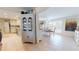 Open concept dining area with tile floors and a view into the kitchen and living area at 6888 121St N St, Seminole, FL 33772