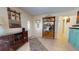 Bright and airy entryway with tile flooring, built-in shelving, and decorative accents at 6888 121St N St, Seminole, FL 33772