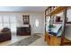 Entryway with white door, wood shelving, and decorative accents at 6888 121St N St, Seminole, FL 33772
