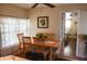 Inviting dining room with a wooden table and chairs, perfect for Gathering meals at 72 Liberty Way # 4, Palm Harbor, FL 34684