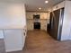 Clean kitchen with white cabinets, modern appliances, and counter seating at 7521 Bougenville Dr, Port Richey, FL 34668