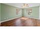 Bright bedroom featuring wood-look floors at 807 Leffingwell Ave, Ellenton, FL 34222