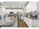Stylish kitchen with granite countertops, stainless steel appliances, and ample cabinet space at 1003 Starboard Ct, Oldsmar, FL 34677