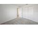 Spacious bedroom with double door closet and gray carpet at 1098 Yarmouth St, Port Charlotte, FL 33952