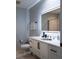 Modern bathroom with sleek vanity, illuminated mirror, and tiled flooring at 1120 E Kennedy Blvd # 1225, Tampa, FL 33602