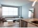 Stylish living room boasts a modern sectional sofa and view of the kitchen at 1120 E Kennedy Blvd # 1225, Tampa, FL 33602