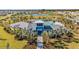 Community pool and clubhouse with playground at 12019 Lansing Gln, Parrish, FL 34219