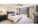 Spacious bedroom with large window and neutral decor at 12019 Lansing Gln, Parrish, FL 34219