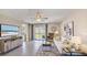 Living room with access to backyard and neutral decor at 12019 Lansing Gln, Parrish, FL 34219
