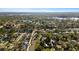 Aerial view of a house and neighborhood at 13208 Lake Magdalene Blvd, Tampa, FL 33618