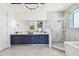 Stylish bathroom showcasing a double vanity, marble floor, and modern fixtures at 20001 Gulf Blvd # 501, Indian Shores, FL 33785