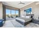 Serene main bedroom with a private balcony and water view at 20001 Gulf Blvd # 501, Indian Shores, FL 33785