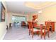 Bright dining room with hardwood floors and a view to the living room at 20853 Eustis Rd, Land O Lakes, FL 34637