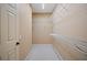 Large walk-in closet with wire shelving at 2223 Rising Creek Court, Dunedin, FL 34698