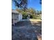 Backyard with a covered patio and gravel area at 2508 50Th N Ave, St Petersburg, FL 33714
