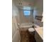 Bathroom with shower/tub combo and white cabinets at 2508 50Th N Ave, St Petersburg, FL 33714